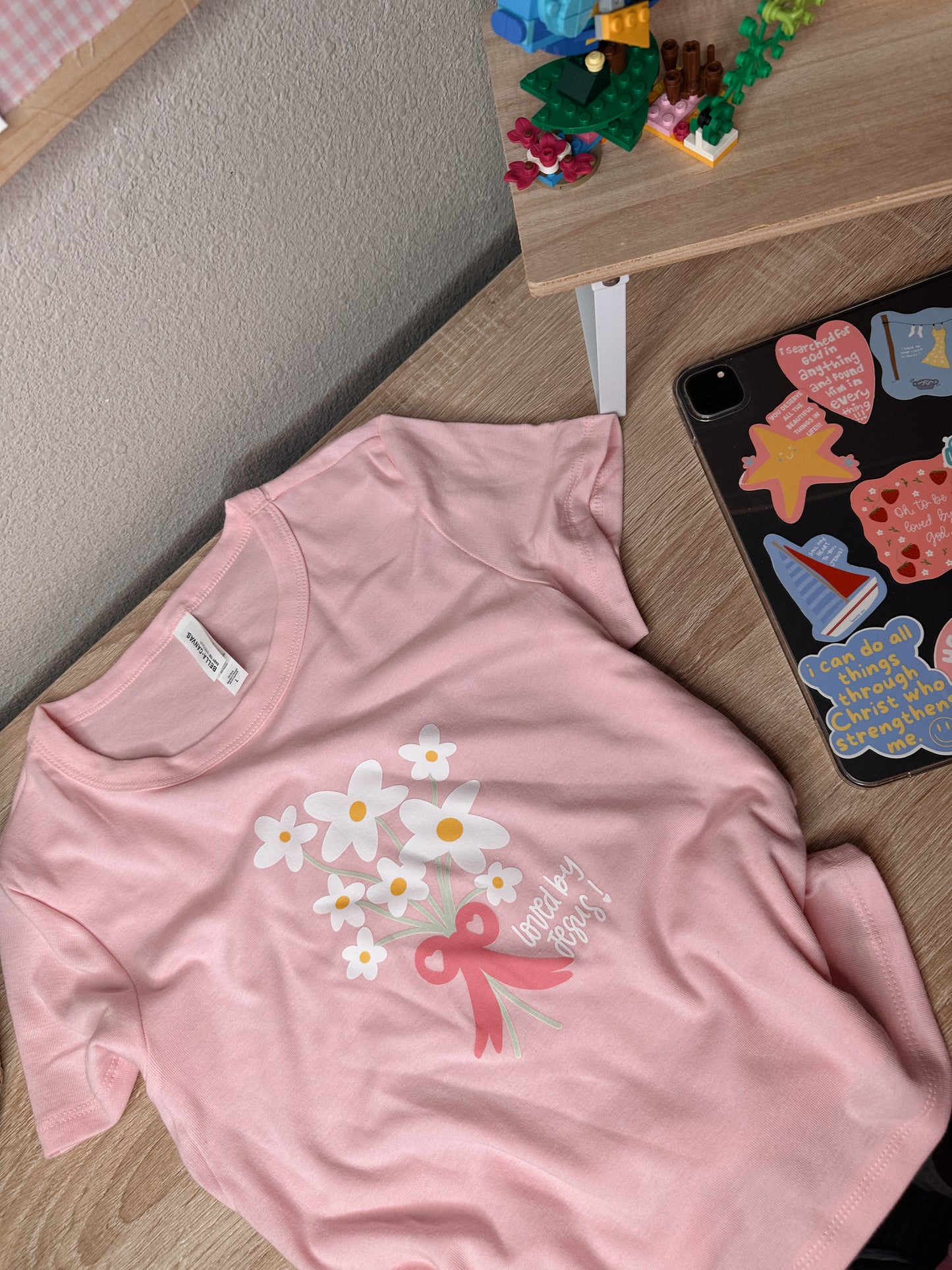 Loved By Jesus Womens Baby Tee